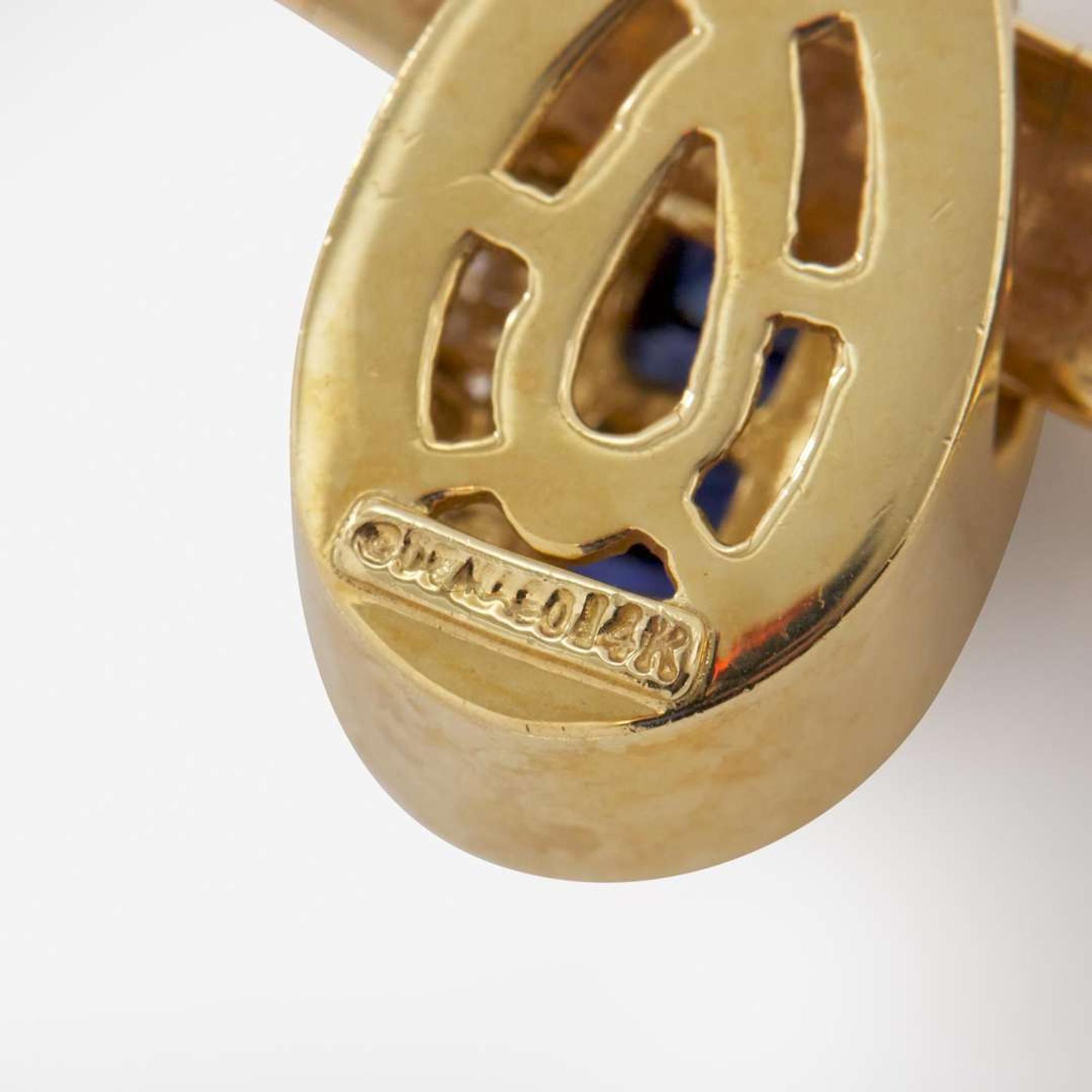 A 14K Yellow Gold, Diamond, and Sapphire Omega Slider Necklace