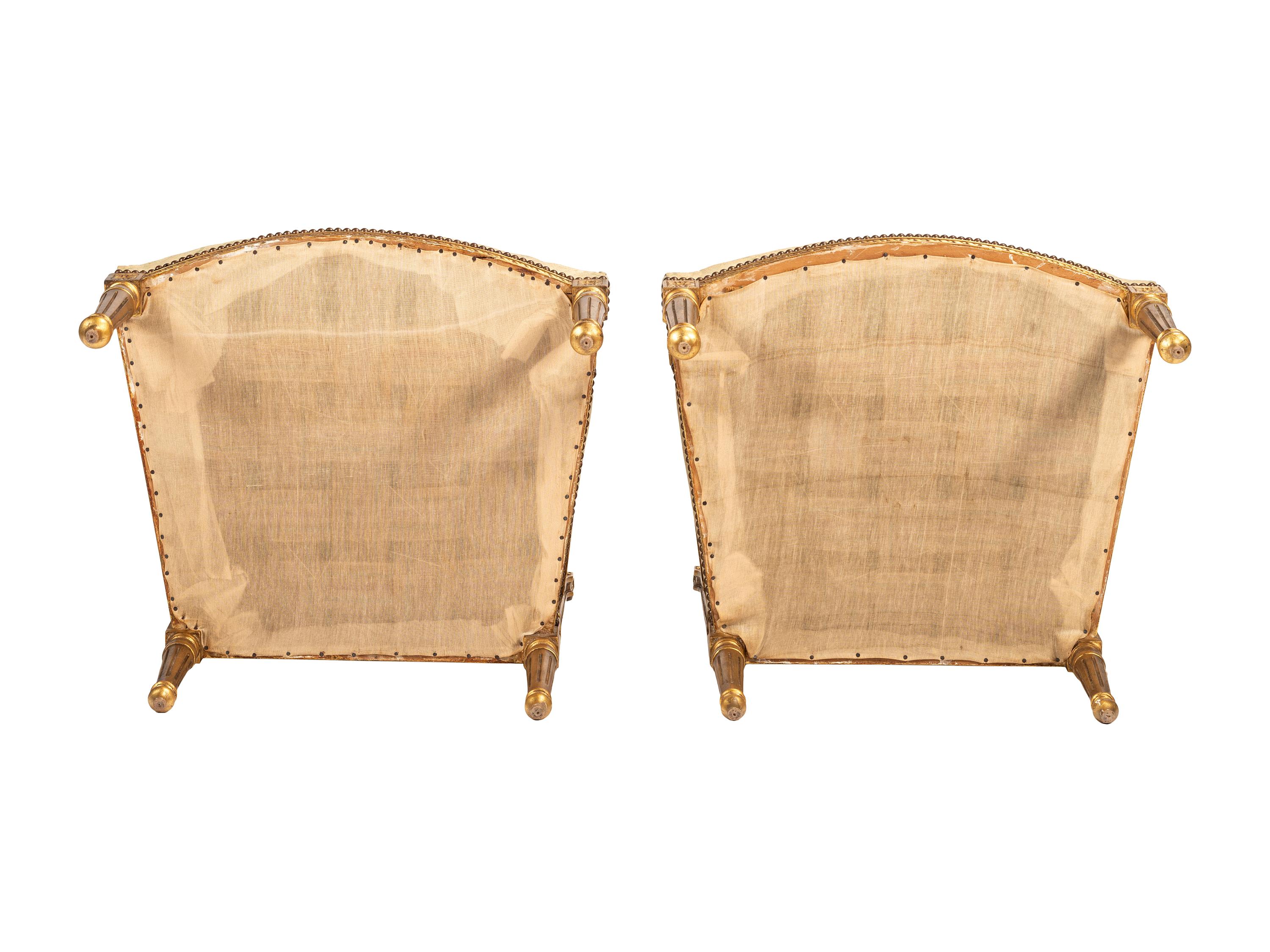 A Pair of Louis XVI-style Carved and Gilt Fauteuils
