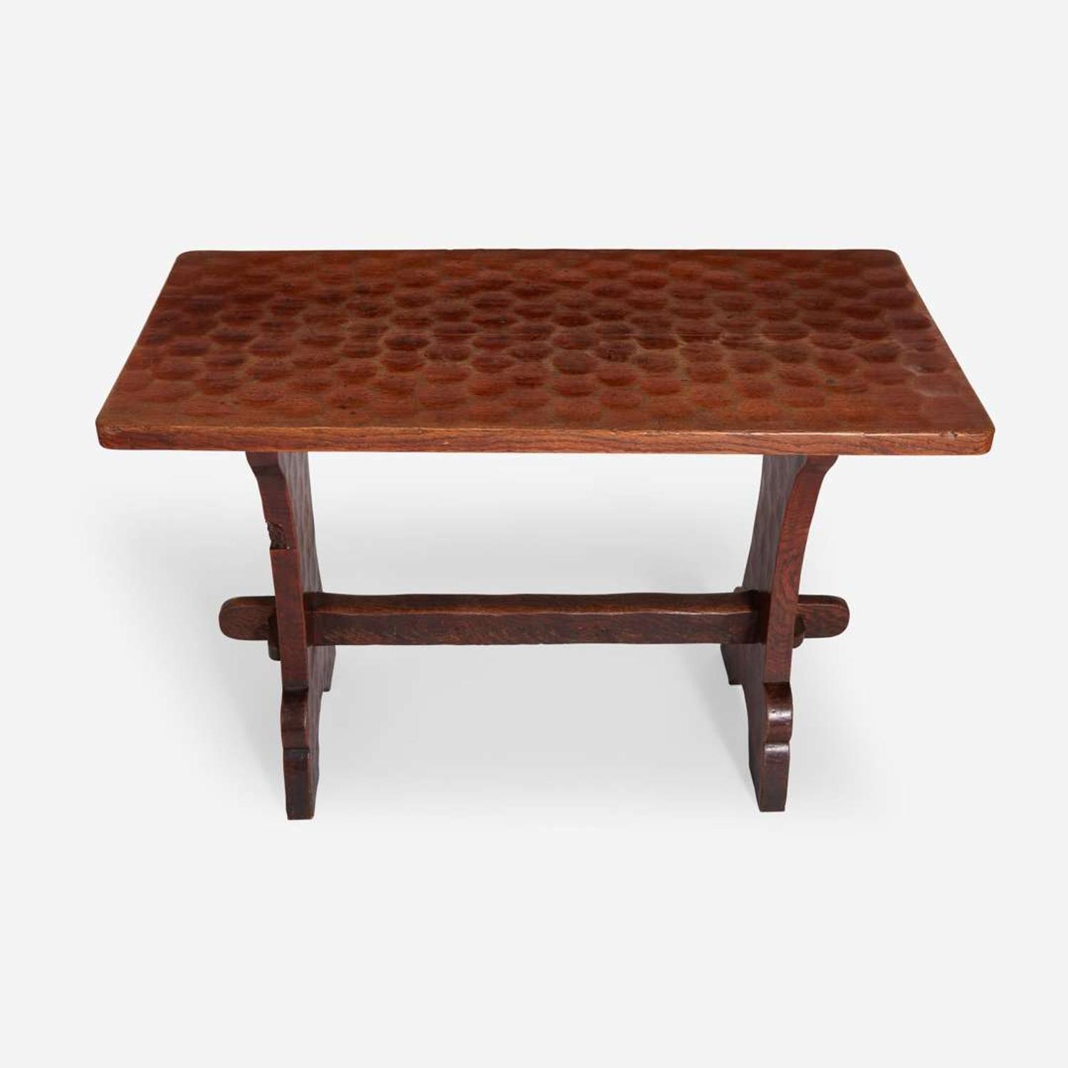 An Arts & Crafts Gnomeman Oak Table with Four Conforming Stools Tom 'Gnomeman' Whittaker (British 1910–1991), circa 1950