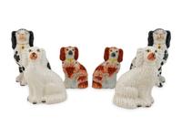 Three Pairs of English Staffordshire Seated Spaniels — 19TH/20TH CENTURY