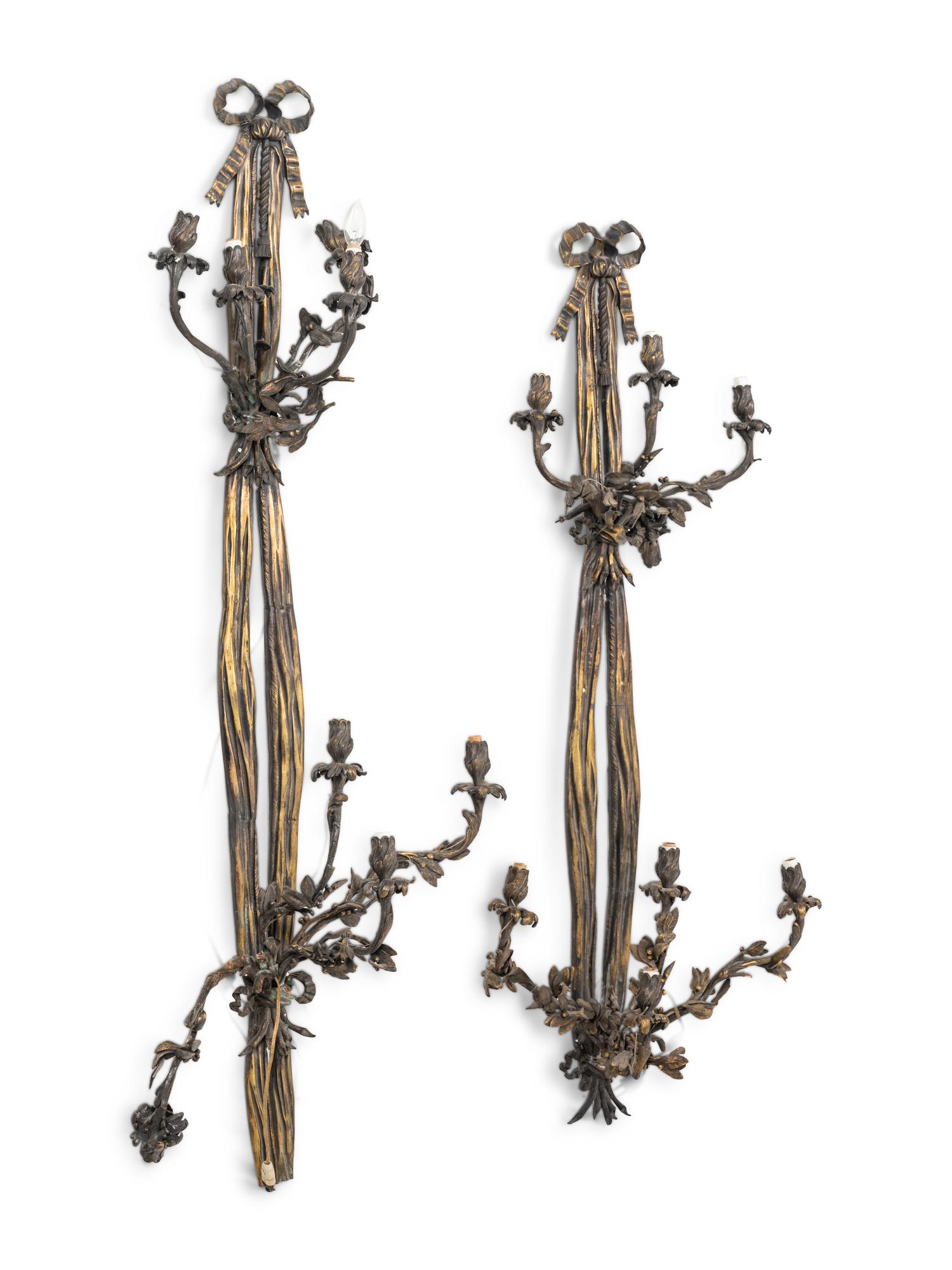 A Pair of Large Louis XVI Style Bronze Seven-Light Sconces