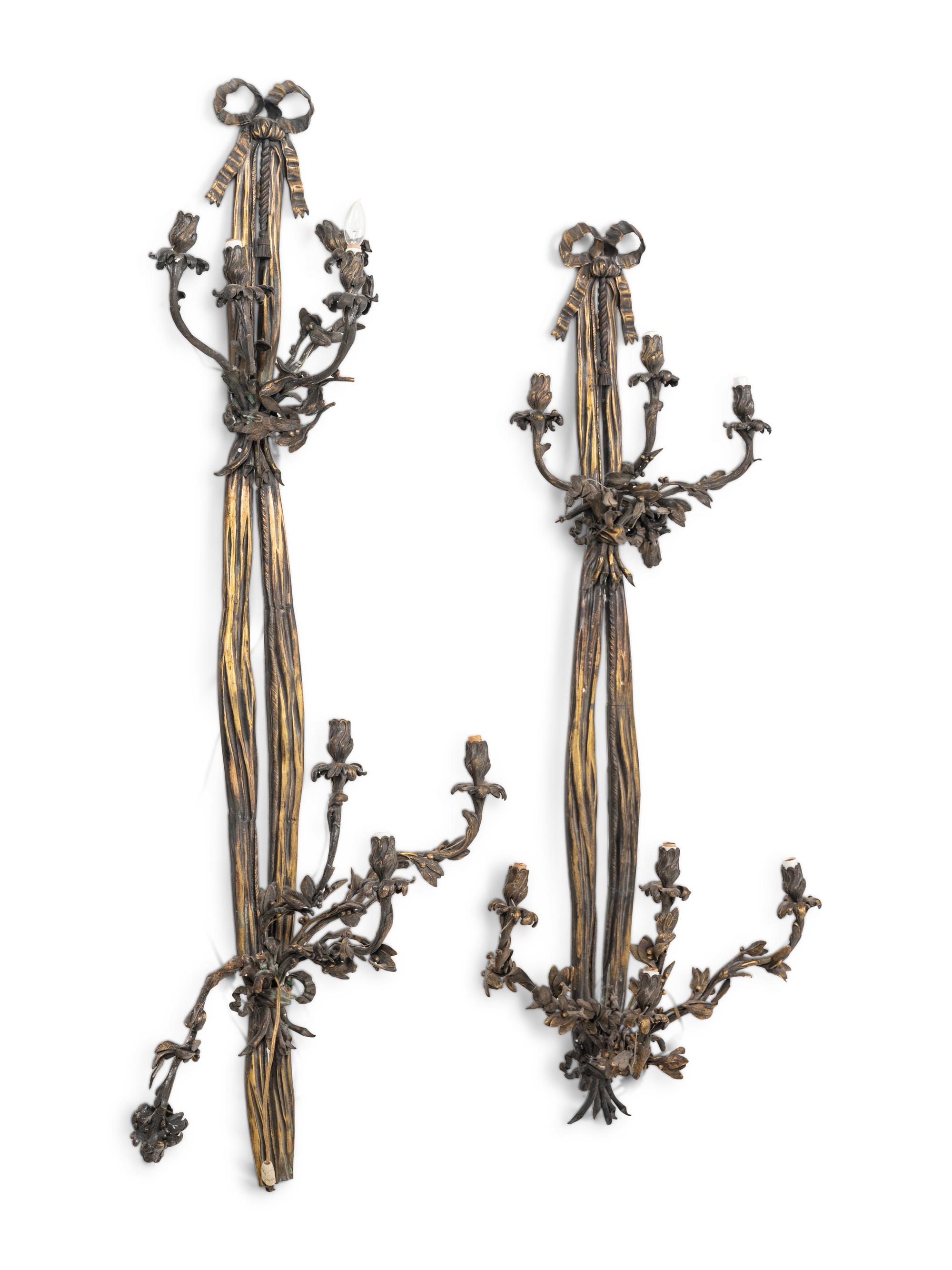 A Pair of Large Louis XVI Style Bronze Seven-Light Sconces