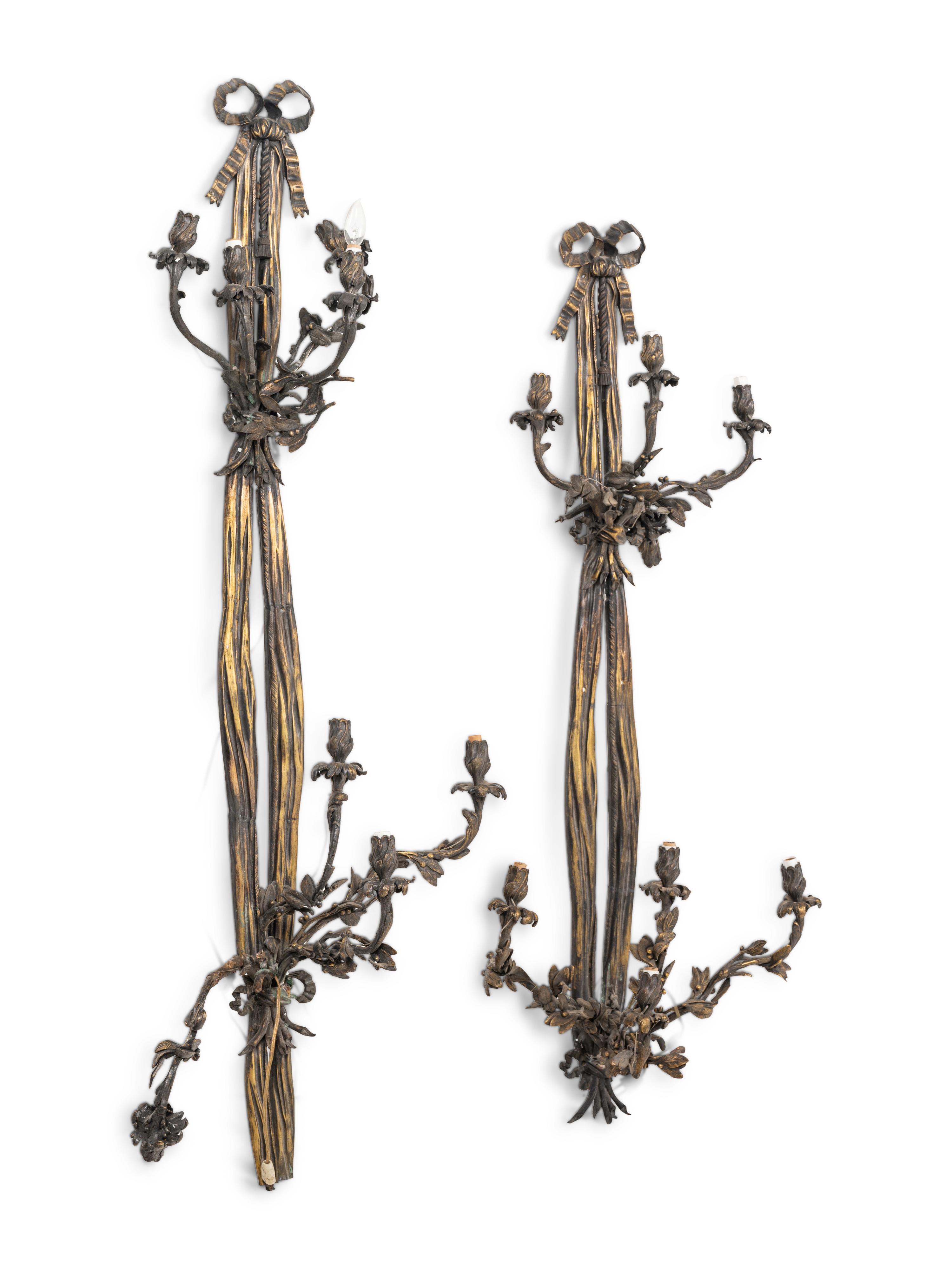 A Pair of Large Louis XVI Style Bronze Seven-Light Sconces