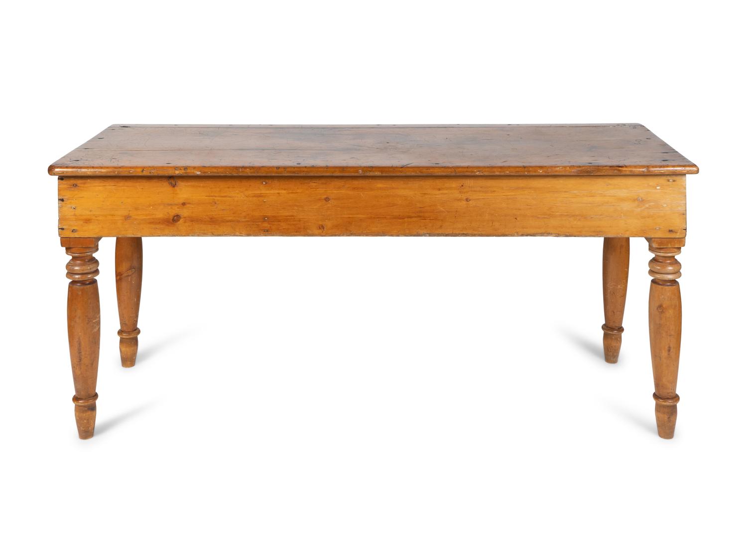 A Continental Provincial Pine Farm Table — 19TH CENTURY