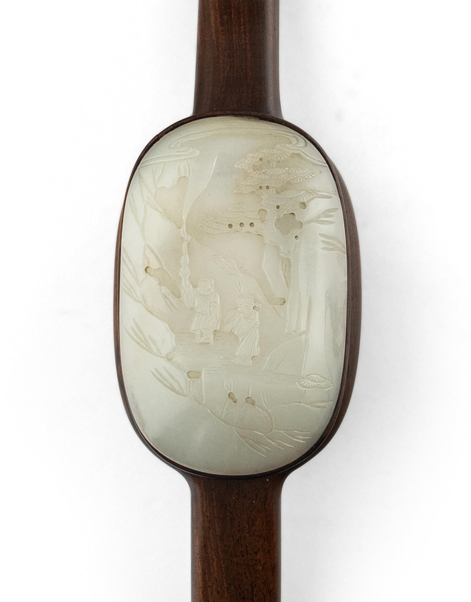 A Chinese White Jade Inset Wood Ruyi Scepter
