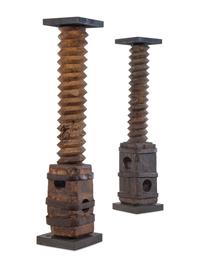 A Pair of French Iron Mounted Grape Presses Converted to Pedestals