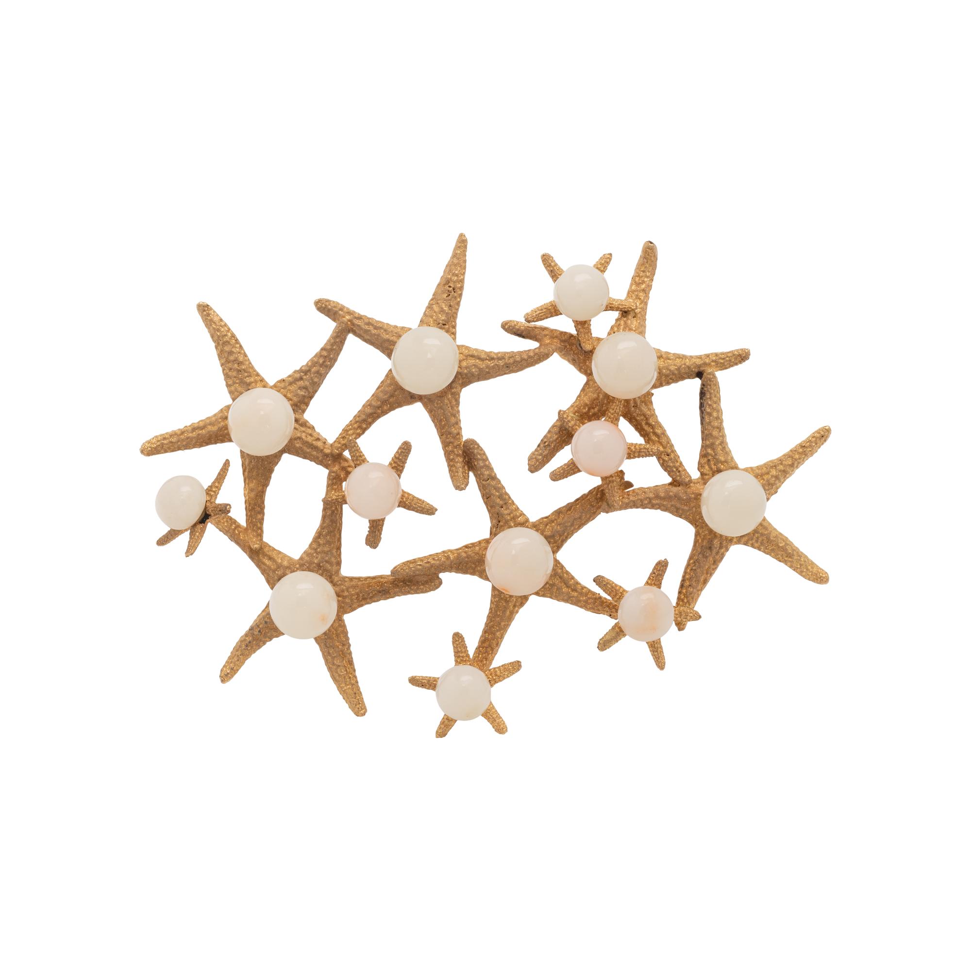 CELLINO, YELLOW GOLD AND CORAL STARFISH BROOCH