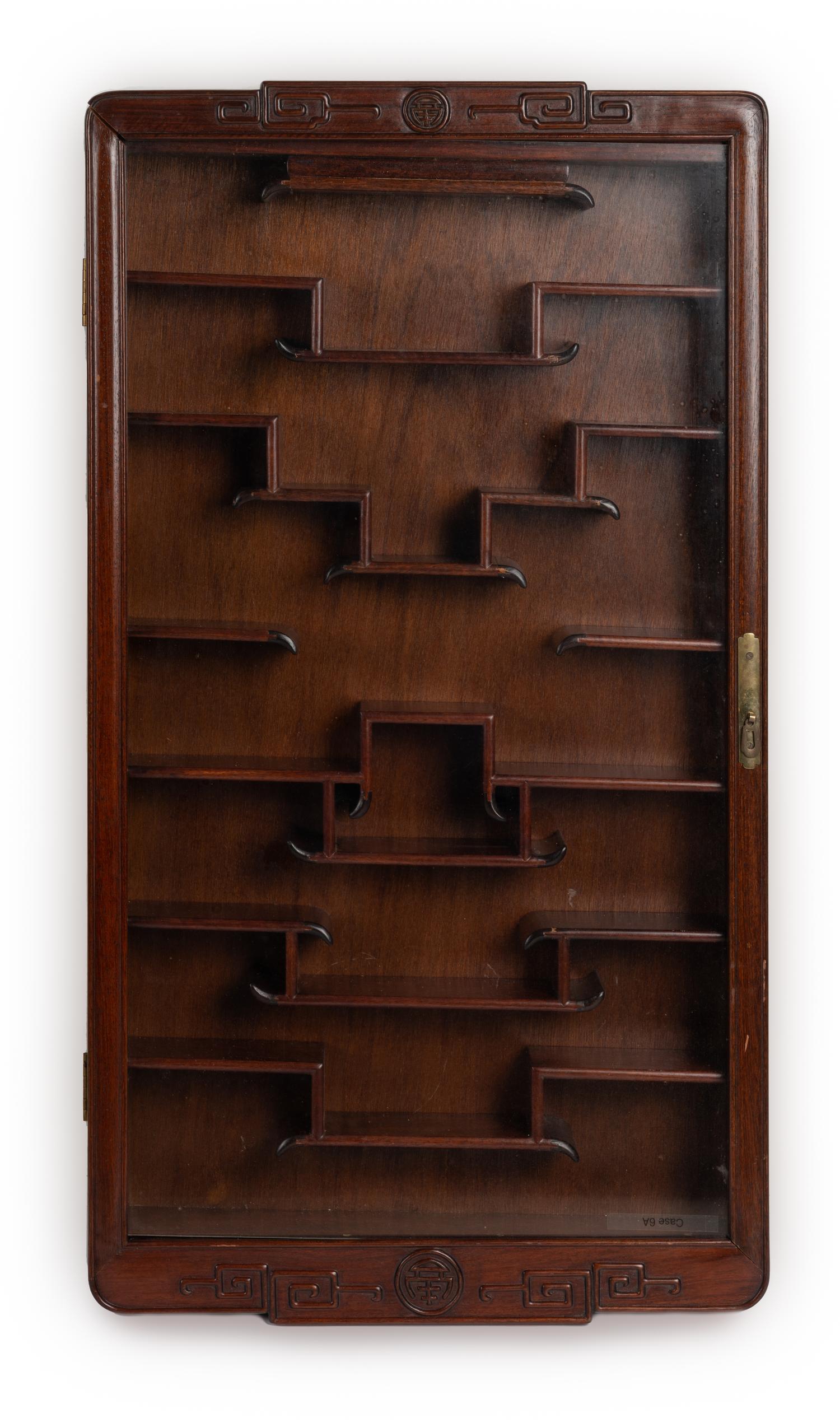 A Pair of Chinese Carved Hardwood Vitrine Cabinets