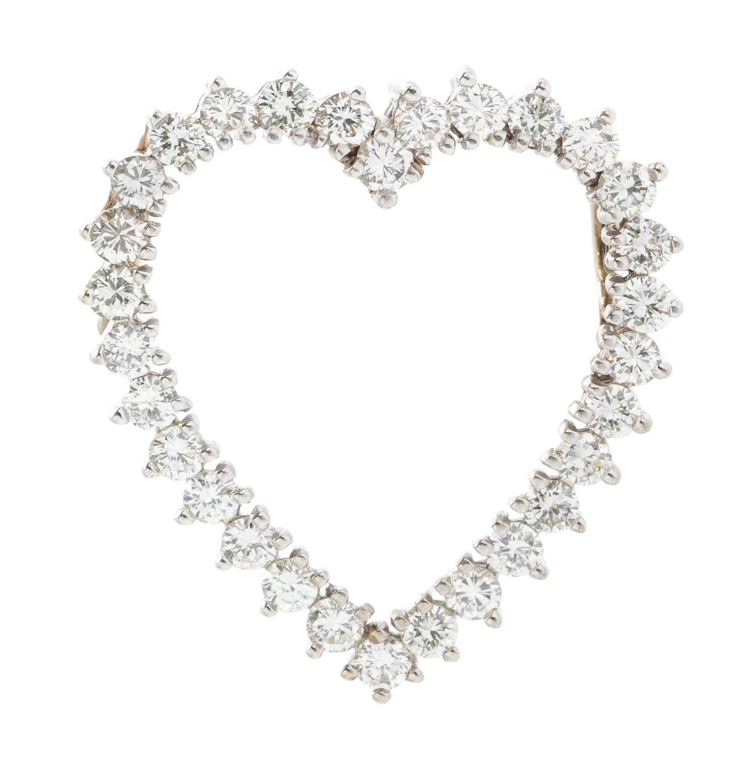 A White Gold and Diamond Heart Pendant, 3.00 dwts.