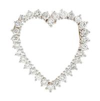 A White Gold and Diamond Heart Pendant, 3.00 dwts.