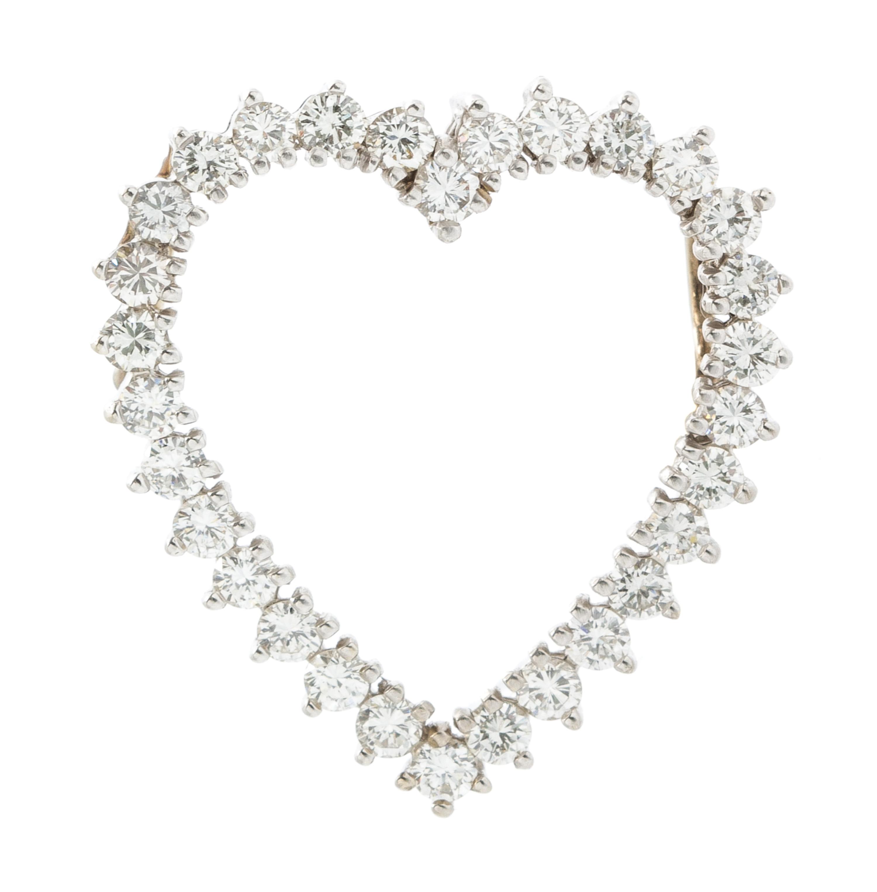 A White Gold and Diamond Heart Pendant, 3.00 dwts.