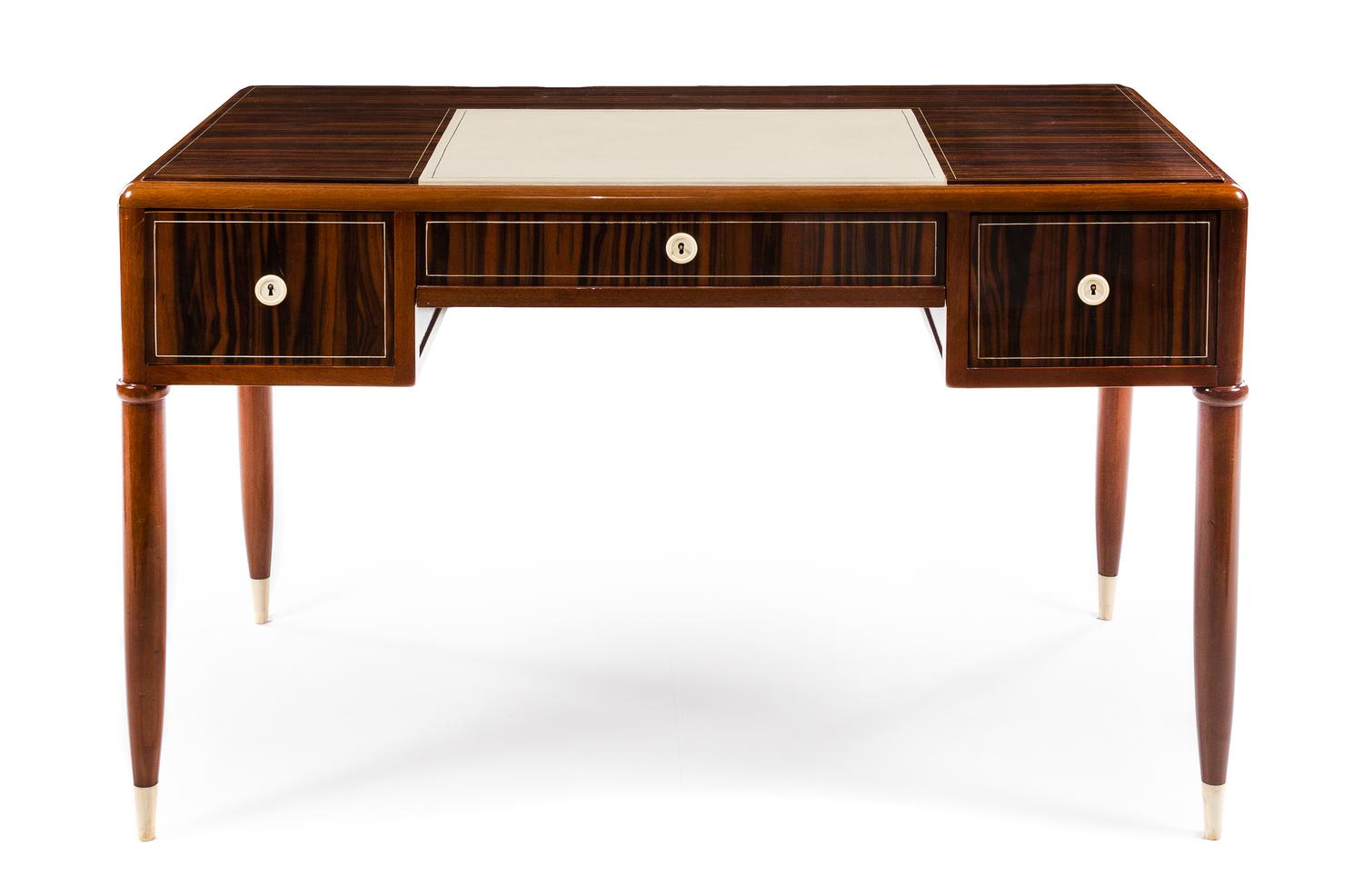 An Art Deco Ebene de Macassar Desk Height 31 x width 50 1/2 x depth 27 1/2 inches