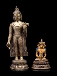 A Sino-Tibetan Gilt Bronze Figure of Buddha and A Bronze Figure of Standing Buddha