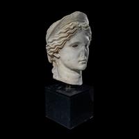 A Roman Marble Head of a Goddess