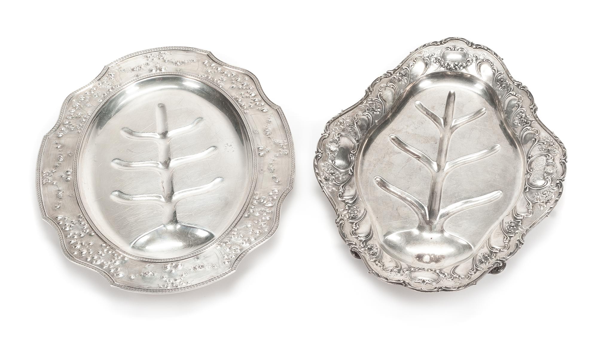 Two American Silver Well-and-Tree Platters, Gorham Mfg. Co., Providence, RI and the Cellini Shop, Chicago, IL, each of shaped oval form