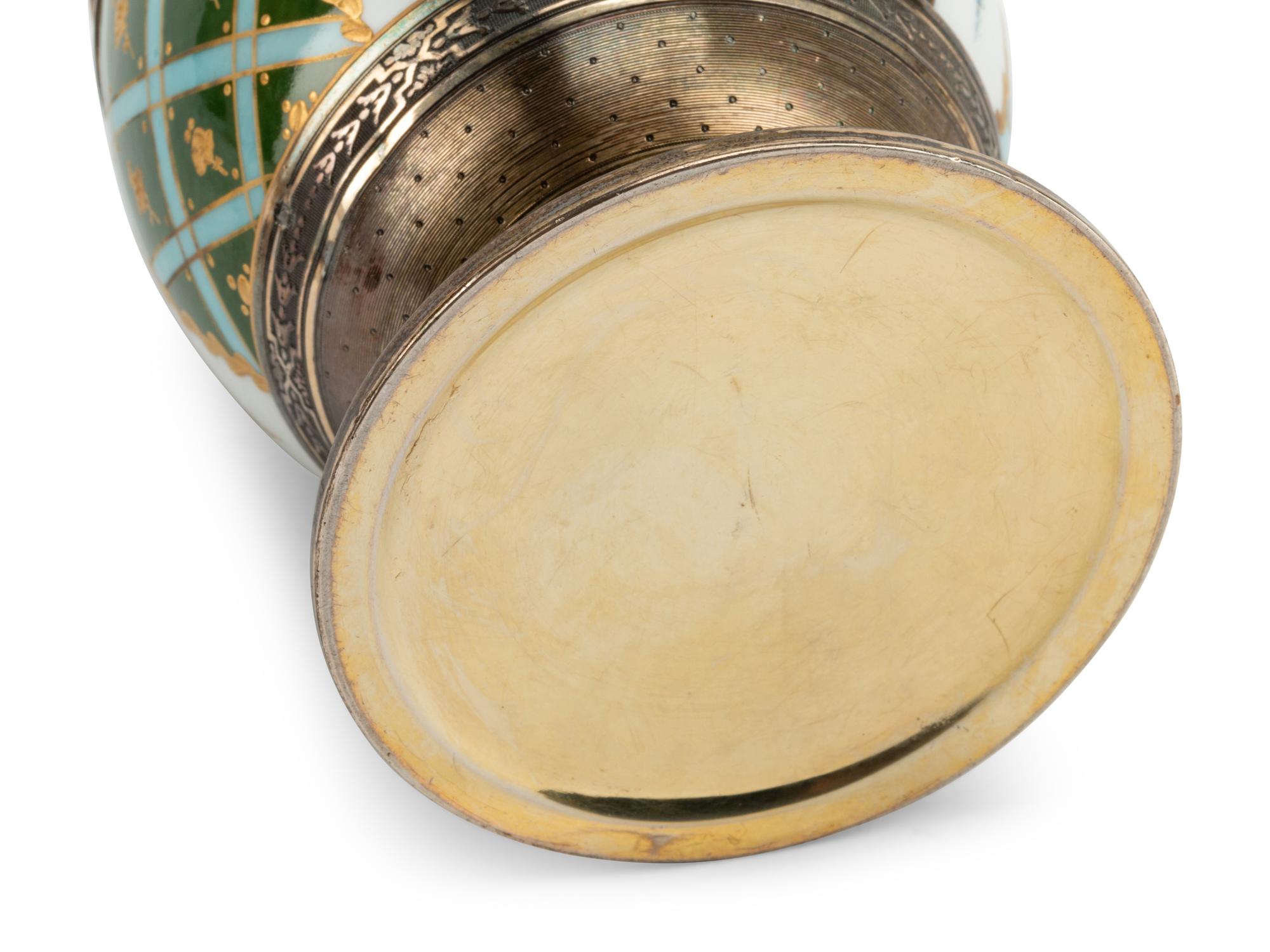 A Continental Silver Mounted Porcelain Egg-Form Box