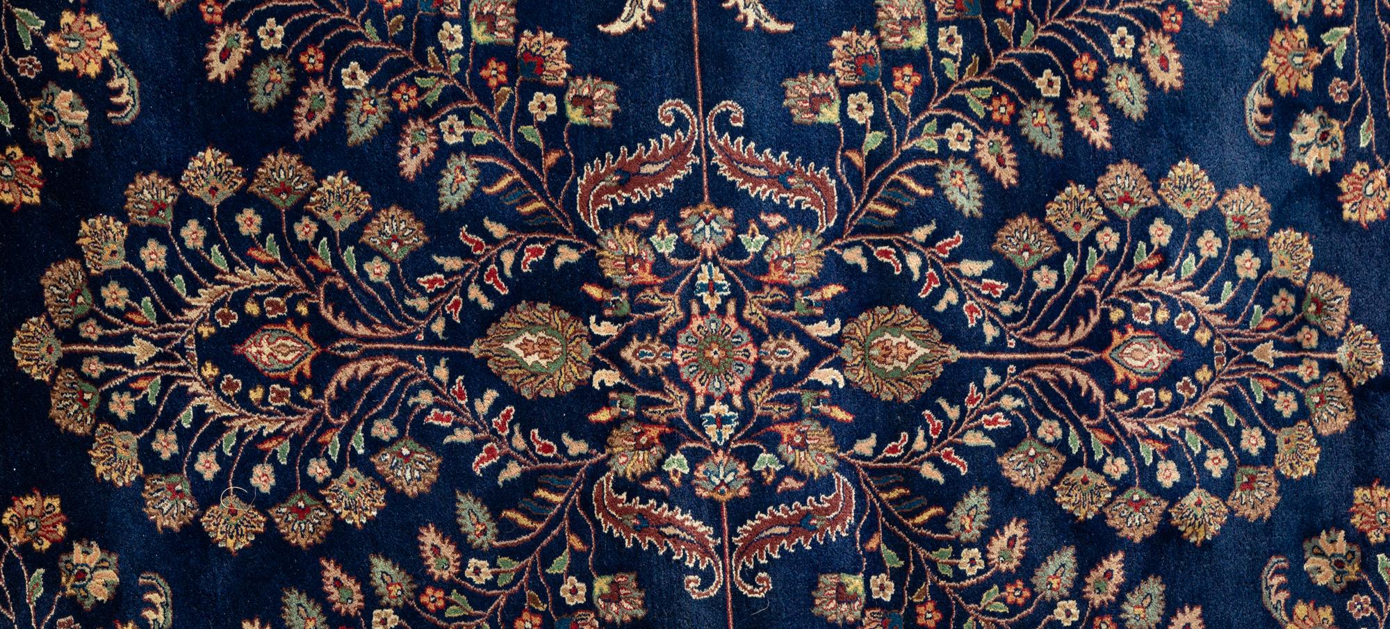 An Indian Persian Design Wool Rug — 20th Century