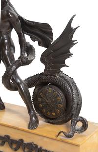 An Empire Bronze Mounted Sienna Marble Figural Mantel Clock