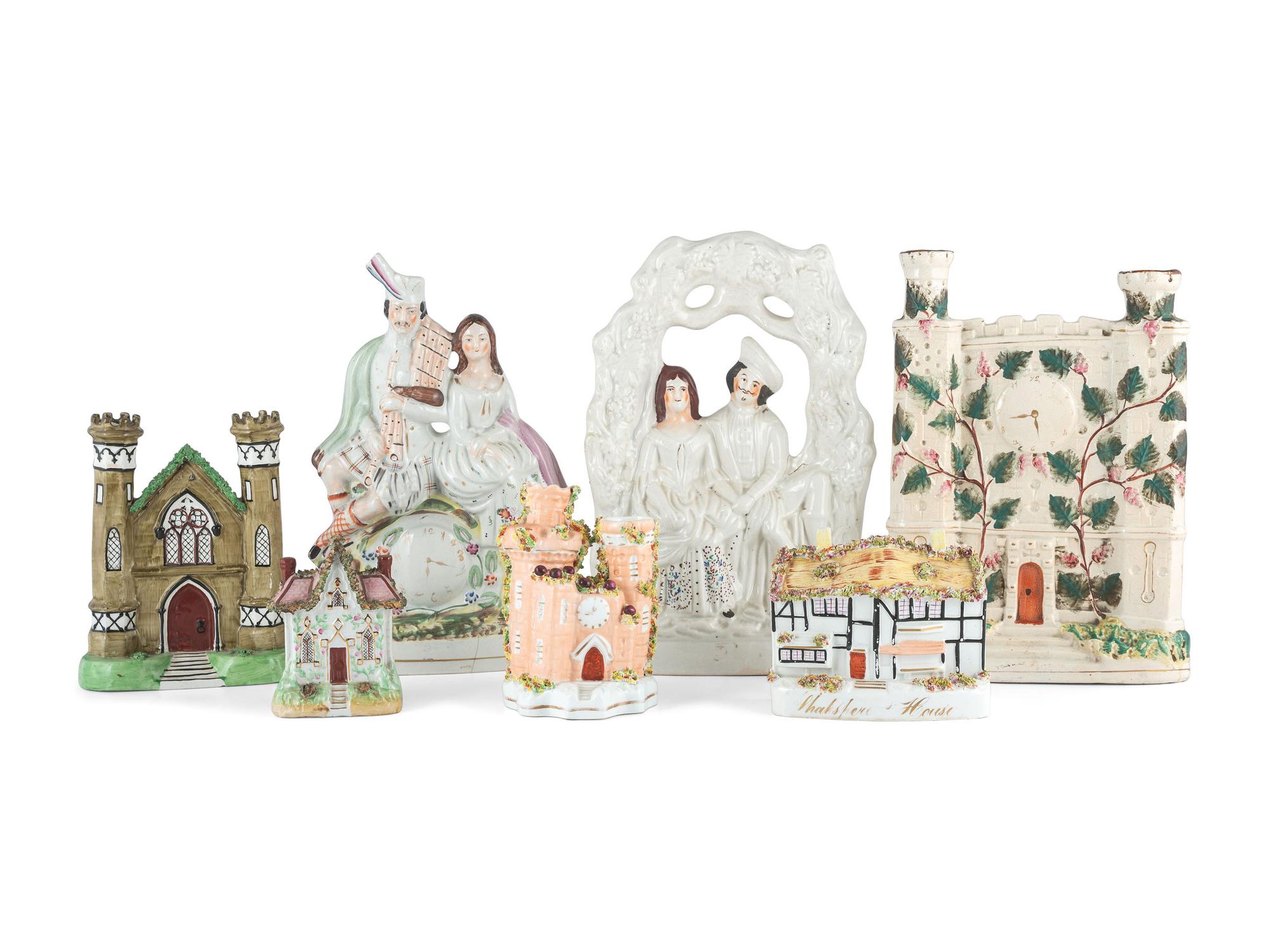 Seven Staffordshire Glazed Earthenware Buildings and Figural Groups