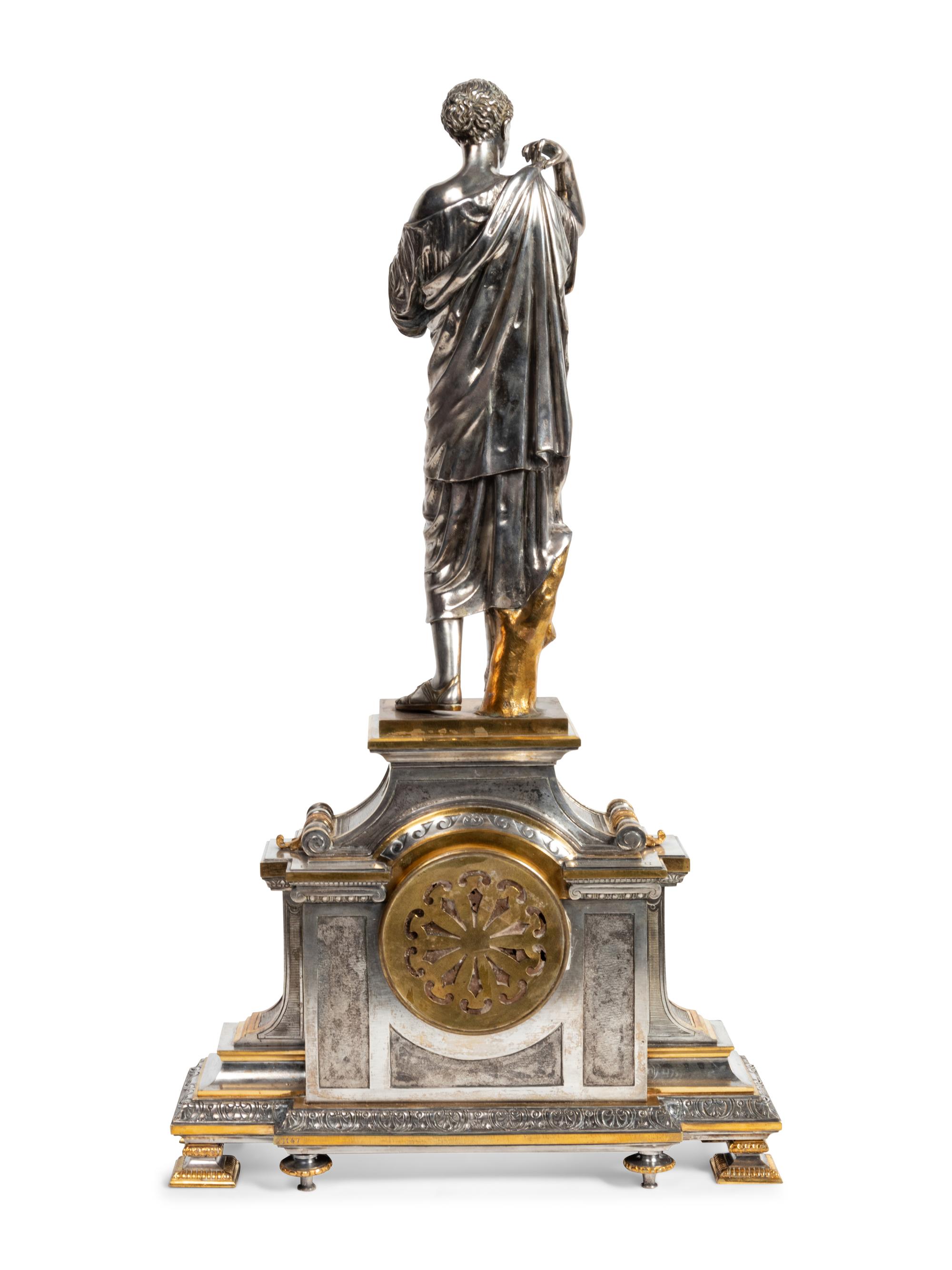 A French Gilt and Silvered Bronze Figural Mantel Clock