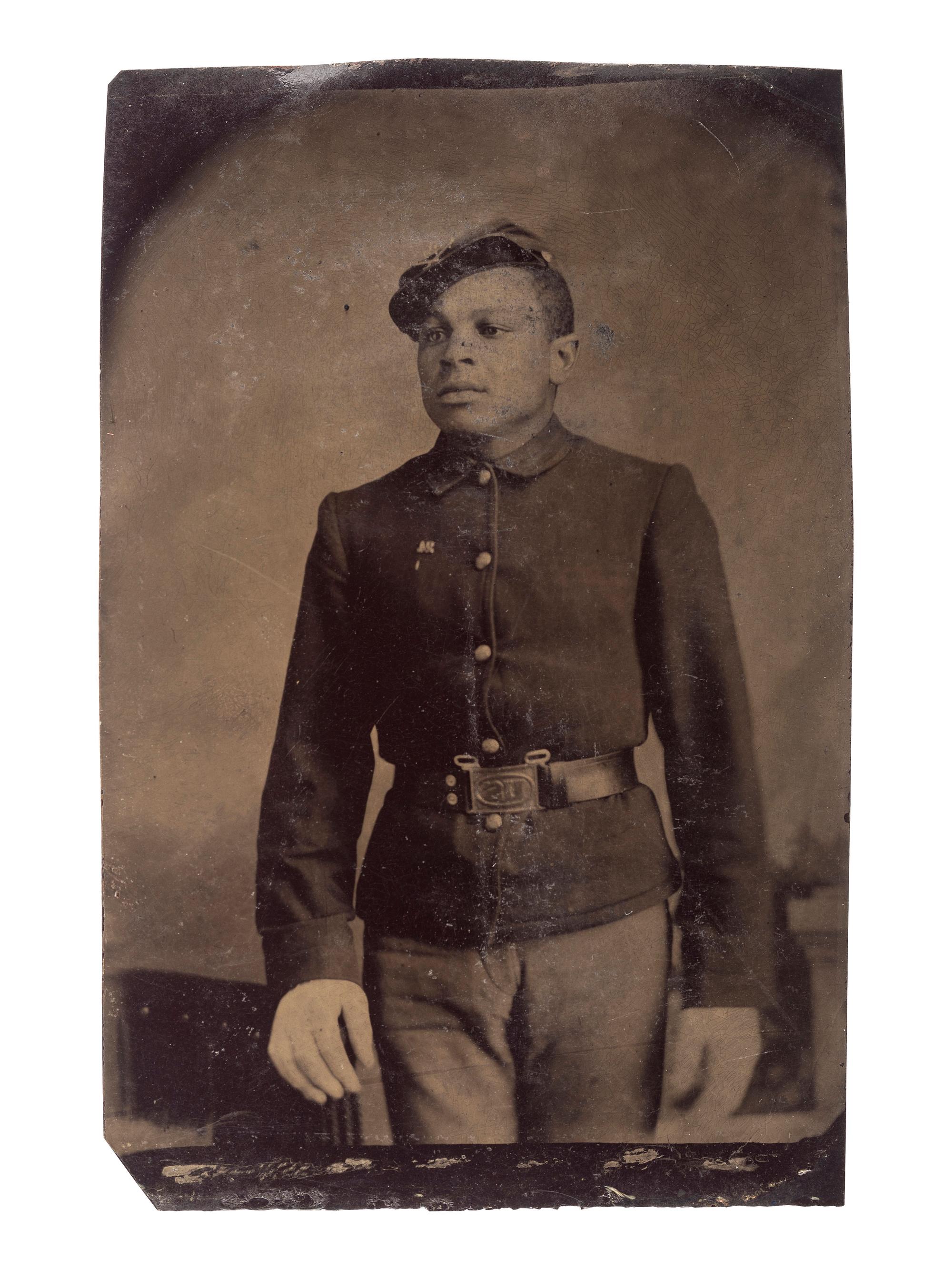 [AFRICAN AMERICANA] -- [LATE INDIAN WARS]. Tintype of an African American private. Ca 1880s.