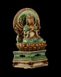 A Chinese Sancai Glazed Stoneware Figure of Seated Guanyin