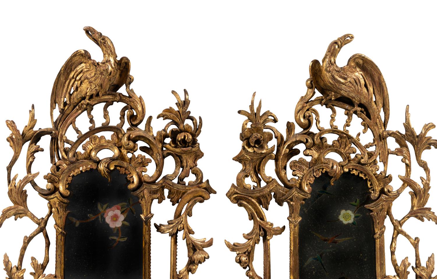 A Pair of George III Giltwood and Reverse-Painted Glass Mirrors