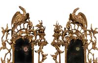 A Pair of George III Giltwood and Reverse-Painted Glass Mirrors