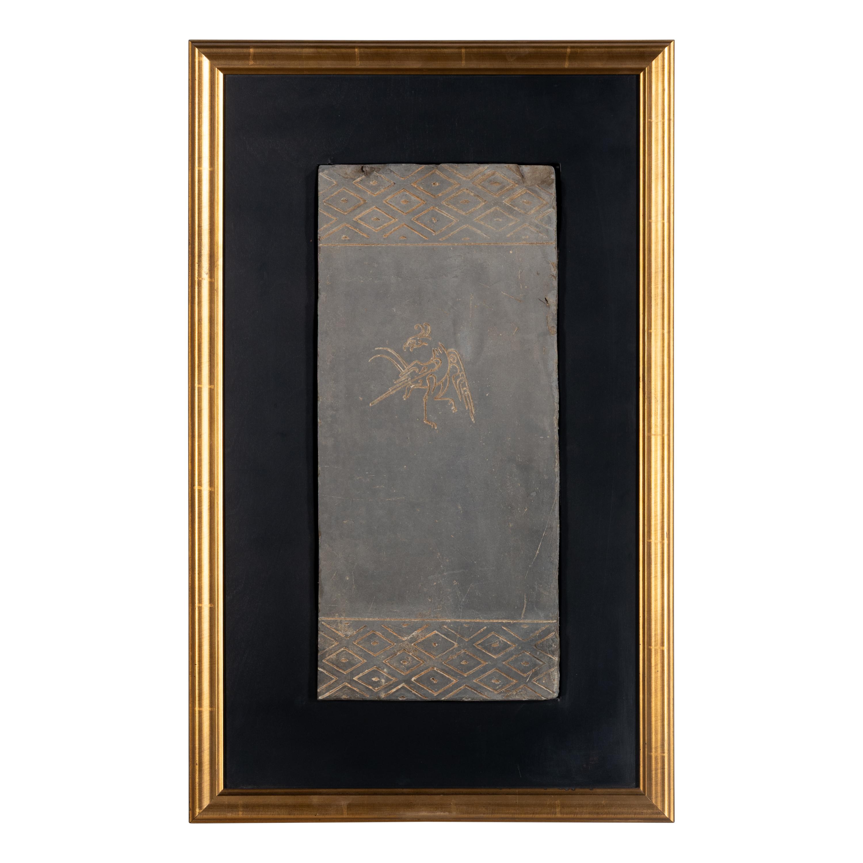 A Chinese Grey Pottery 'Vermilion Bird' Tomb Brick Fragment, Han Dynasty — 漢 模印朱雀紋陶磚
