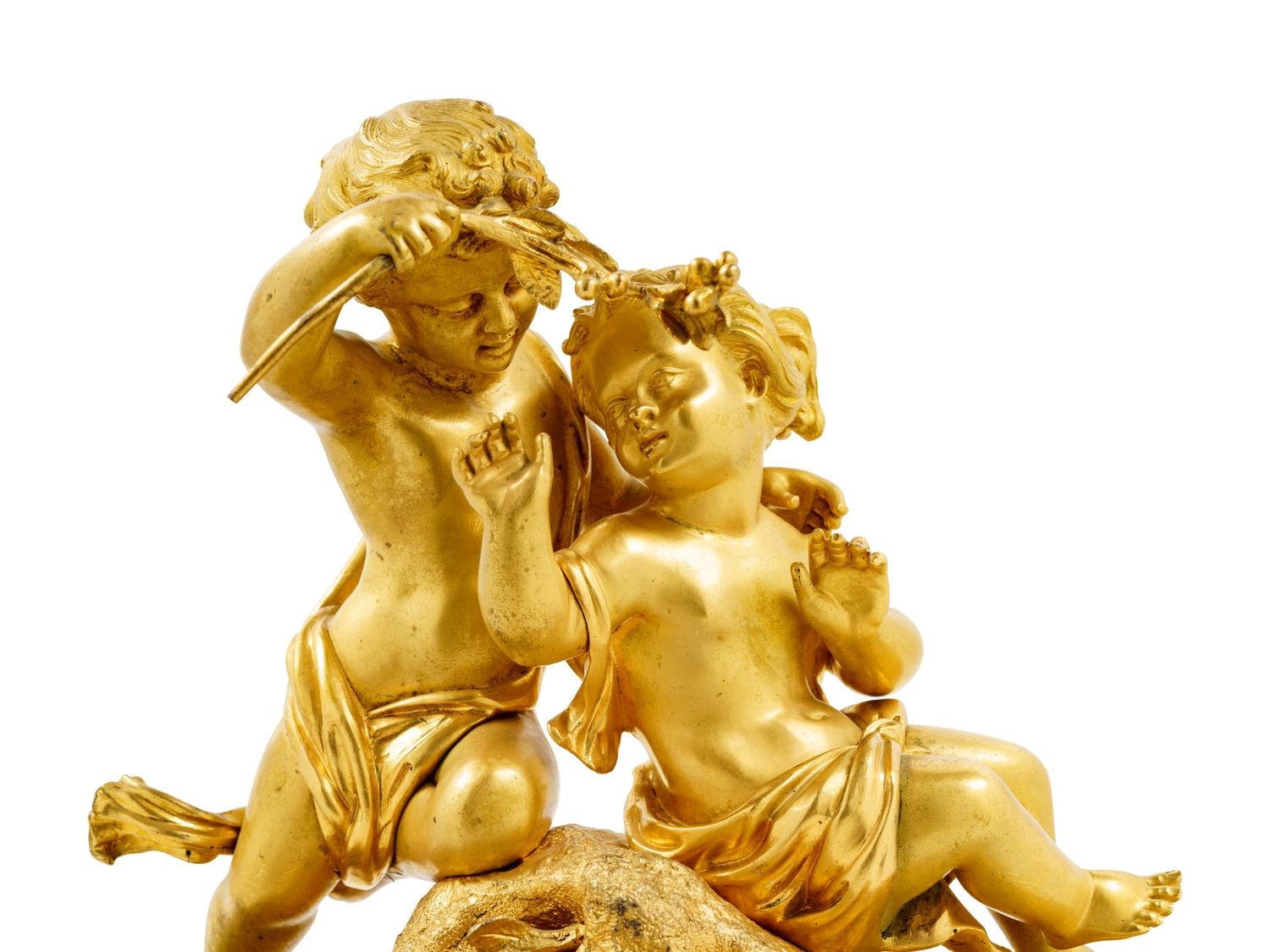 A Louis XV Style Gilt Bronze Mounted White Marble Figural Mantel Clock