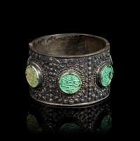 A Chinese Green Plastic Inset Silver Bracelet Diameter 2 1/4 inches. — 19TH CENTURY