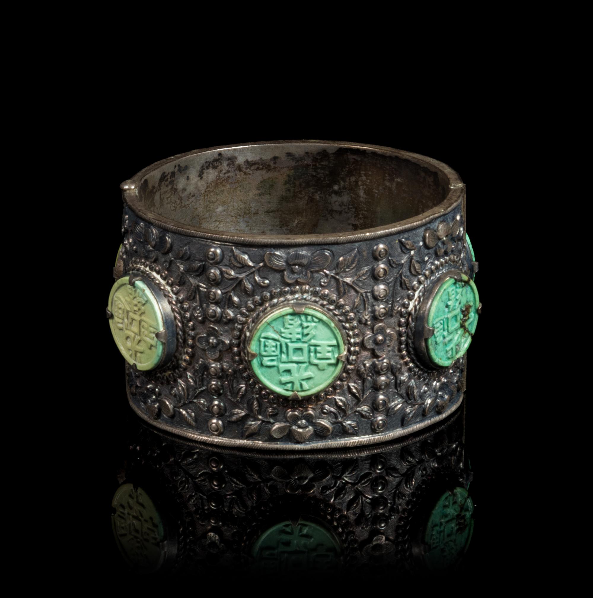 A Chinese Green Plastic Inset Silver Bracelet Diameter 2 1/4 inches. — 19TH CENTURY
