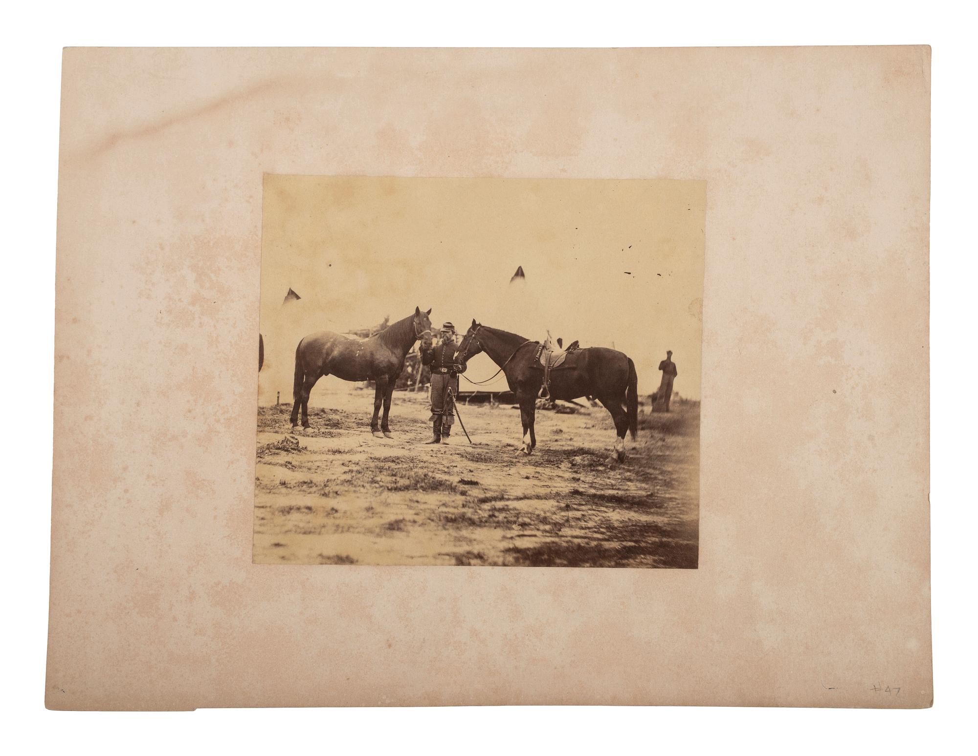 [CIVIL WAR]. GARDNER, Alexander, photographer. Albumen photograph of cavalry trooper with horses.