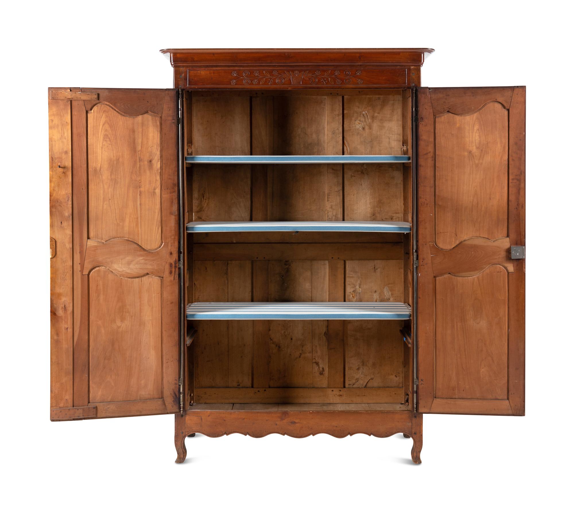 A Louis XV Provincial Walnut Armoire