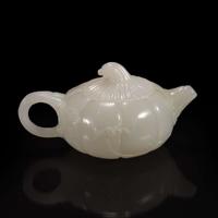 A small Chinese white jade melon-form teapot 瓜形玉茶壶