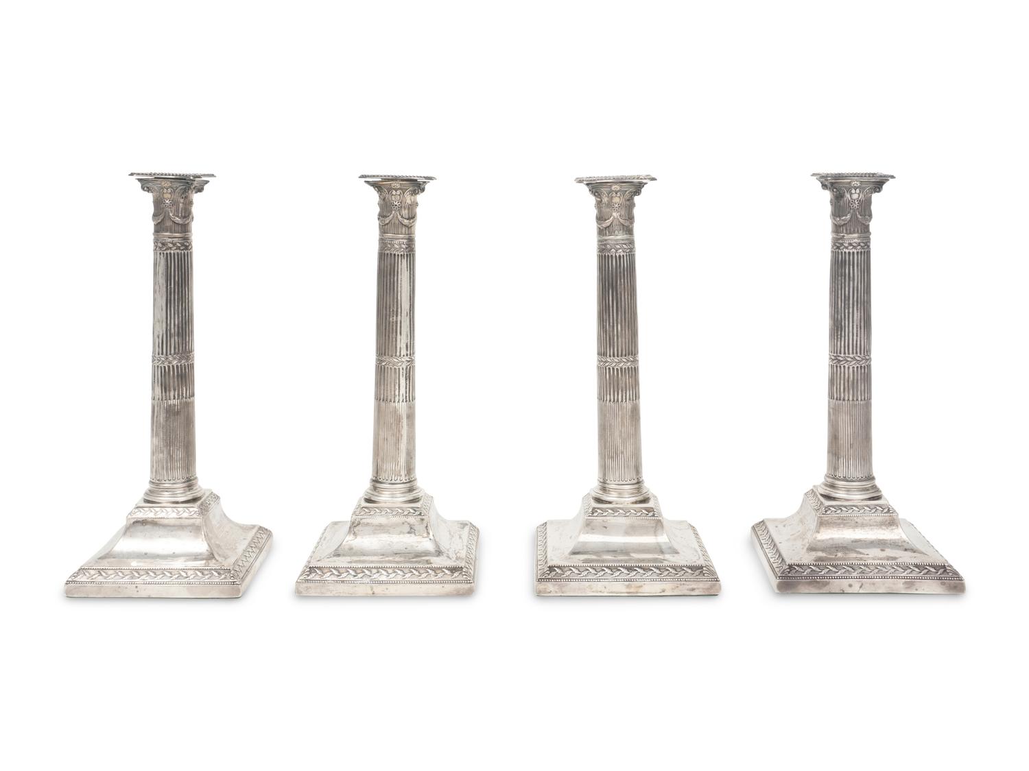 Two Near Pairs of English Silver Candlesticks