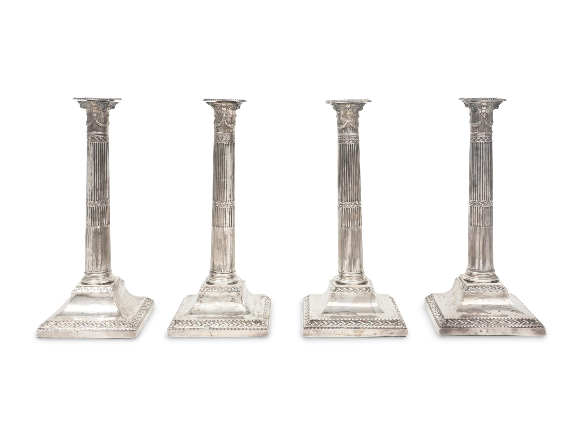 Two Near Pairs of English Silver Candlesticks