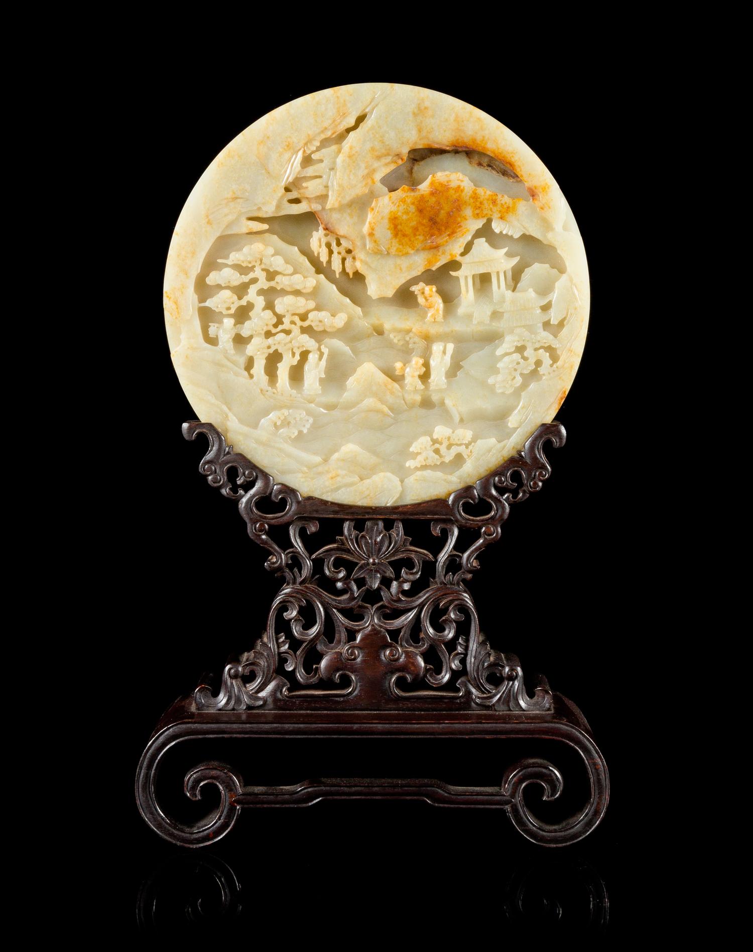 A Carved Celadon Jade Table Screen Diameter of jade 8 1/4 inches. — QING DYNASTY