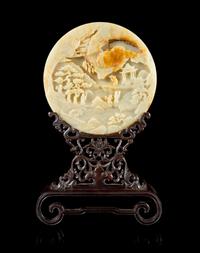 A Carved Celadon Jade Table Screen Diameter of jade 8 1/4 inches. — QING DYNASTY