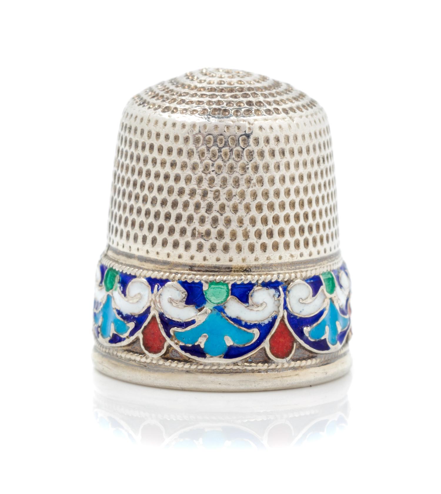 A Russian Silver and Enamel Thimble, Likely Vasily Andreyev, Moscow, 20th Century, the knurled top and body above a polychrome enamel b