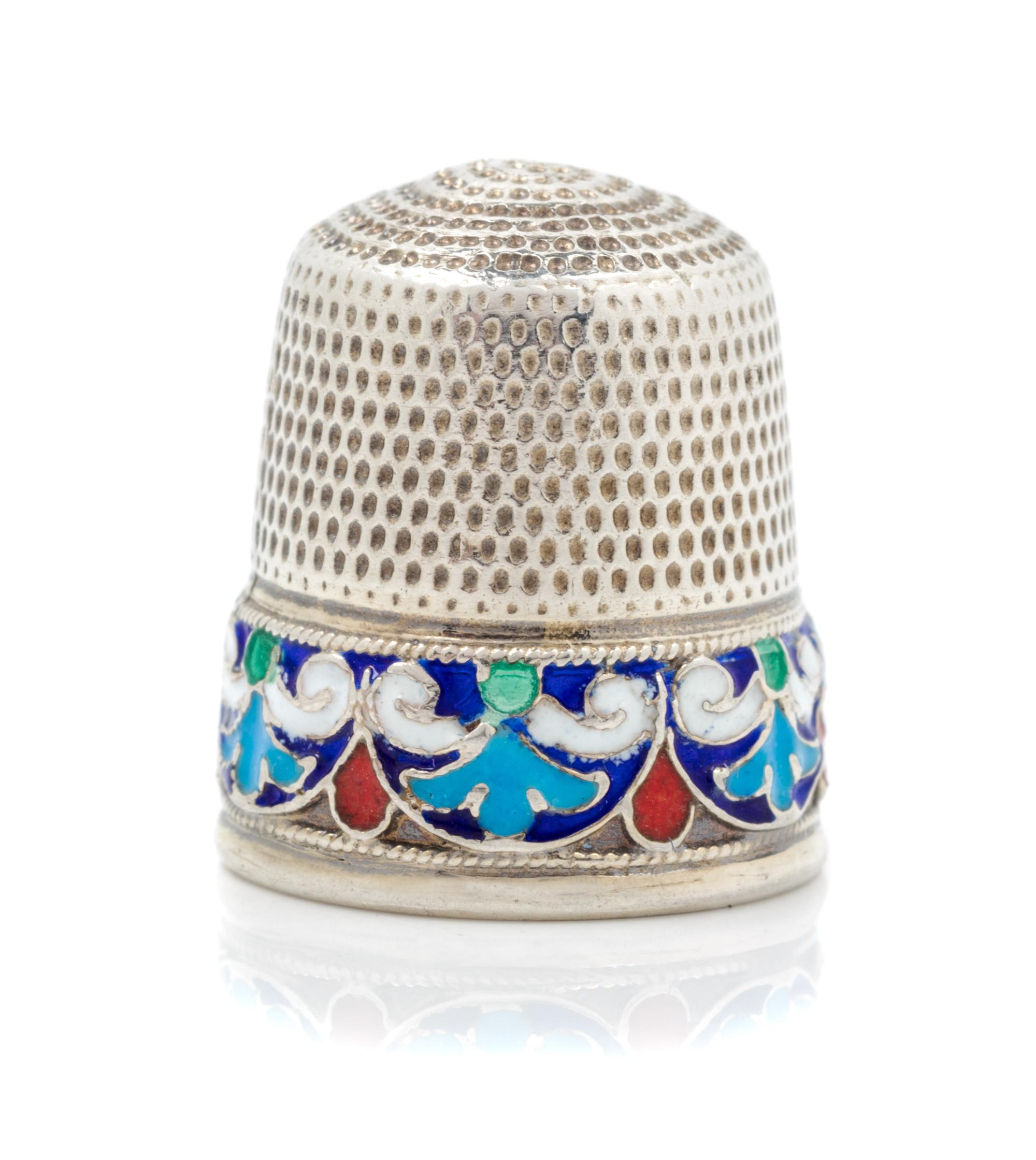 A Russian Silver and Enamel Thimble, Likely Vasily Andreyev, Moscow, 20th Century, the knurled top and body above a polychrome enamel b