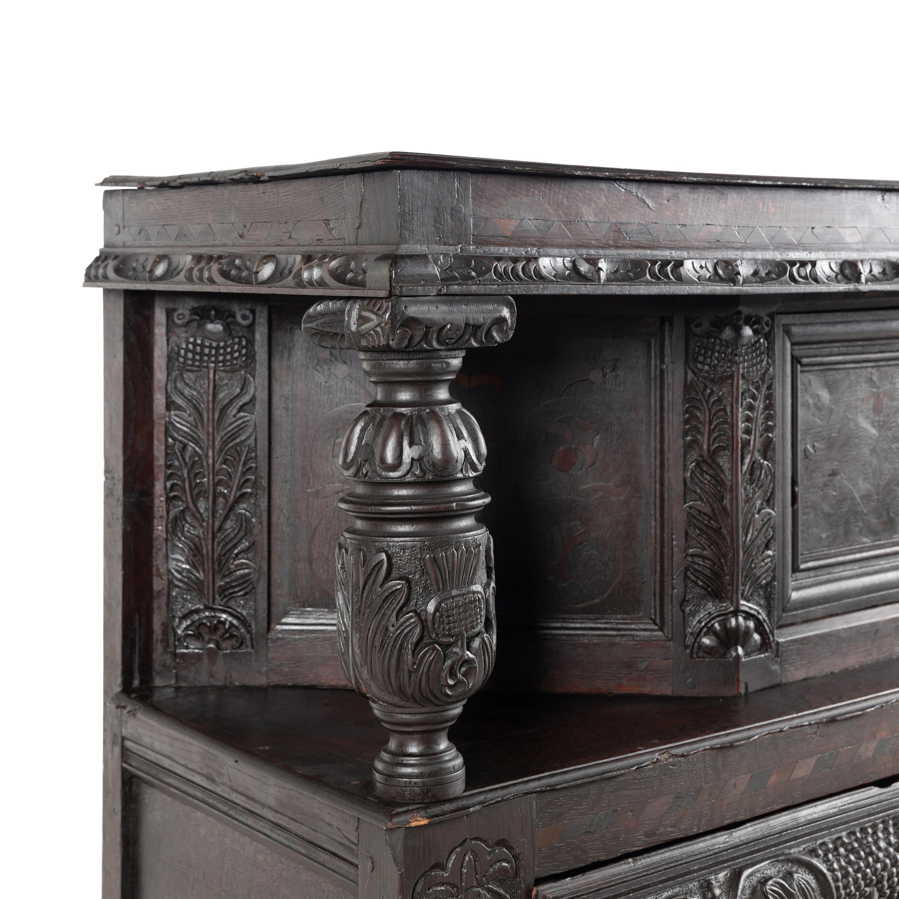 A William and Mary Carved Oak and Marquetry Court Cupboard