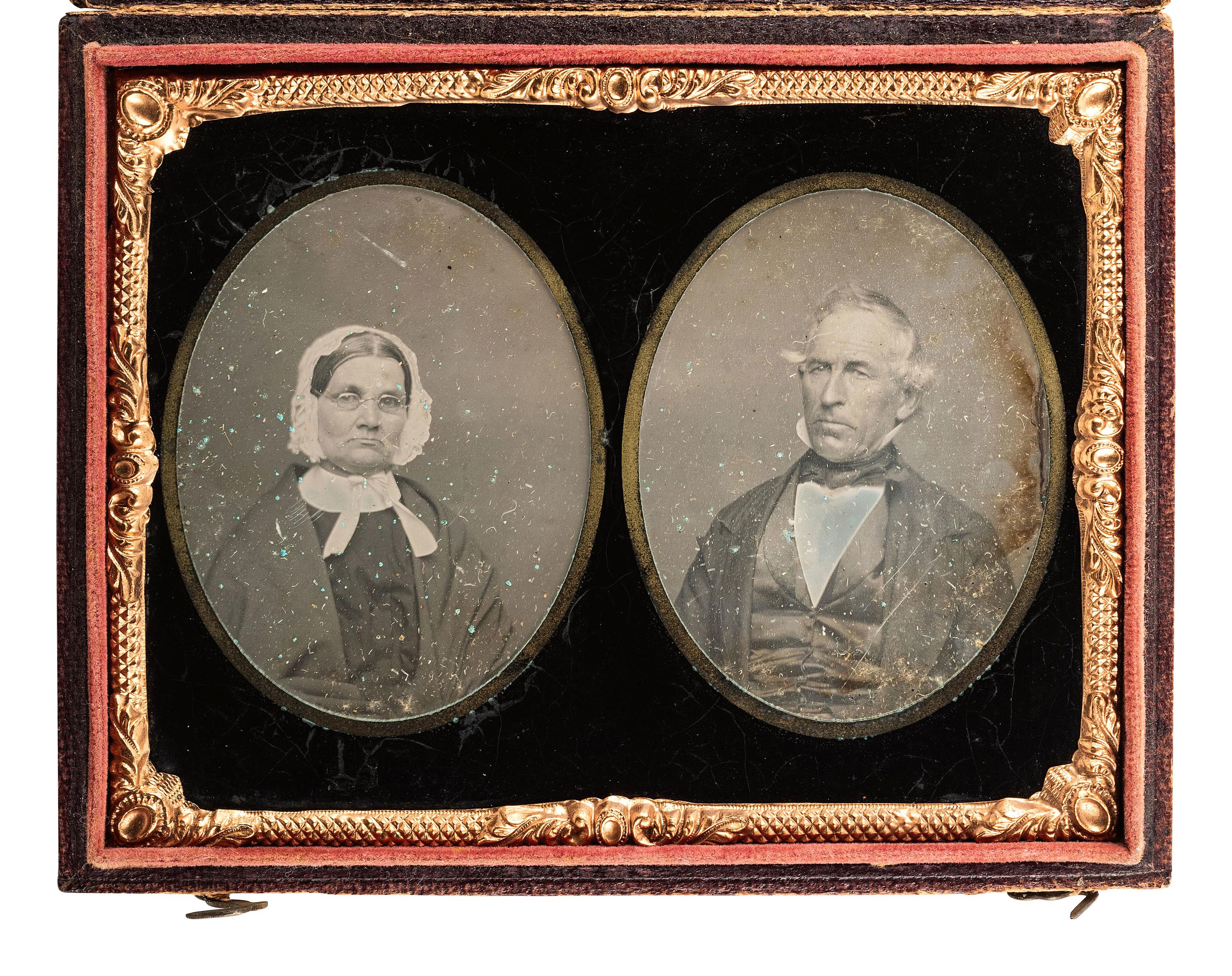 [EARLY PHOTOGRAPHY]. Quarter plate daguerreotype displaying separate portraits of an aged man and woman executed on the same plate and covered by a double ninth plate mat.