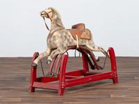 A Carved and Painted Wood Child's Riding Horse Toy