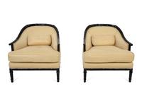 A Pair of Bamboo-Carved Black Lacquered Club Chairs — 20TH CENTURY