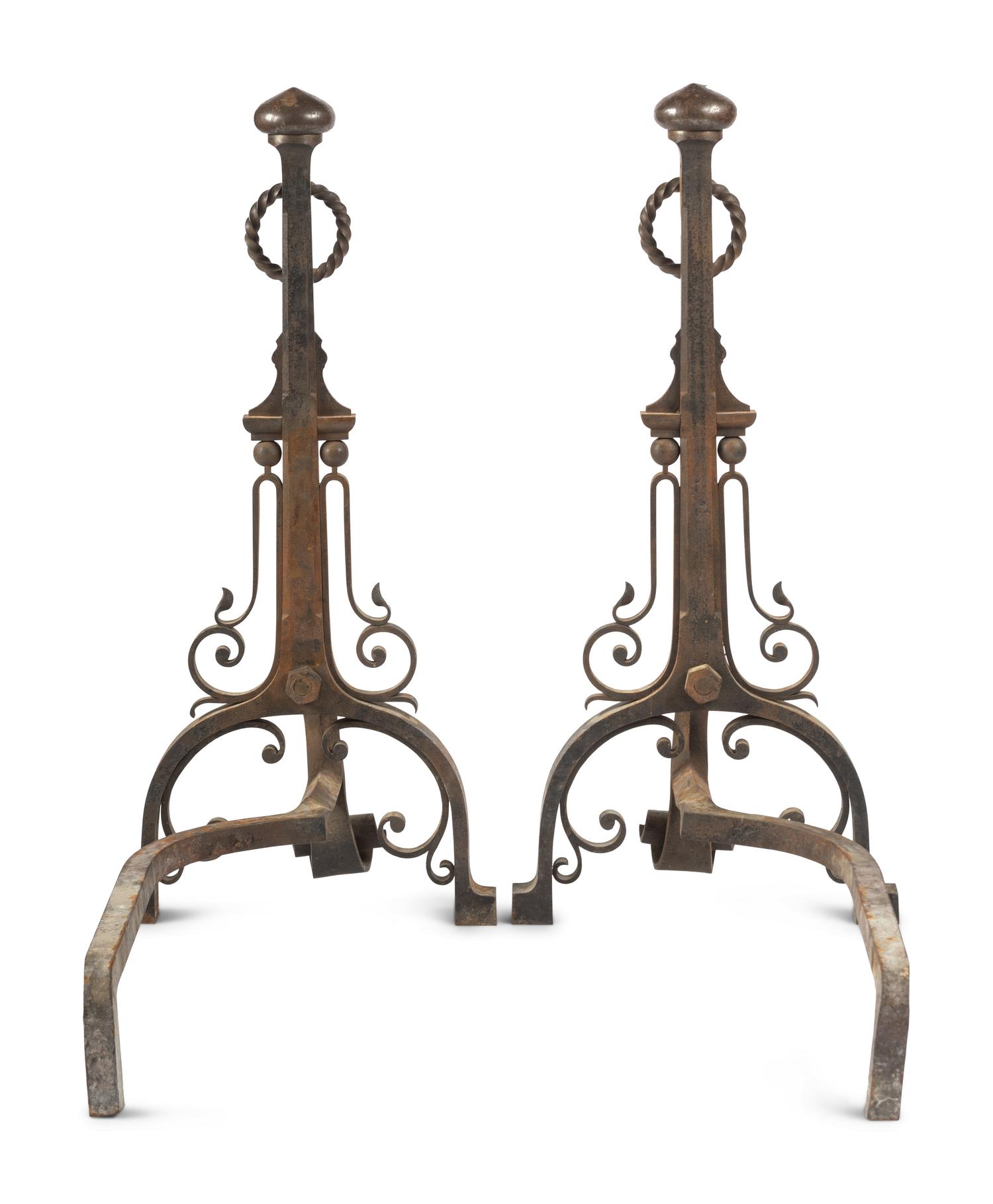 A Pair of English Arts and Crafts Iron Andirons