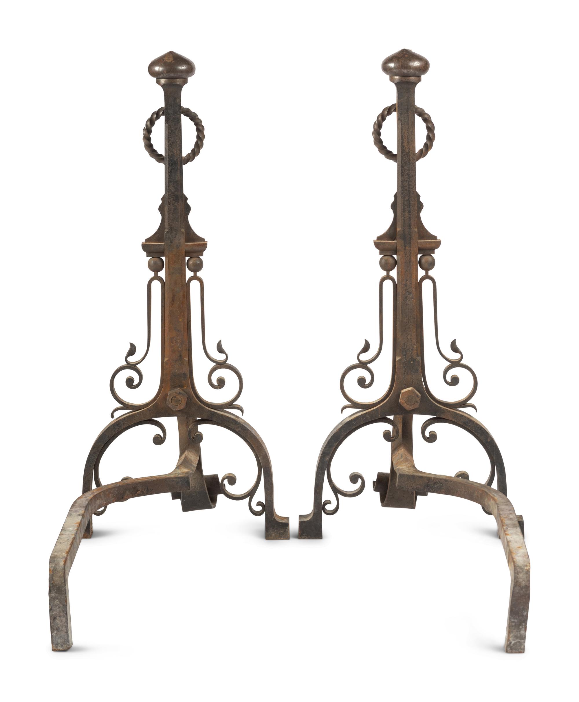 A Pair of English Arts and Crafts Iron Andirons
