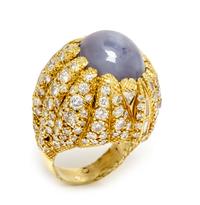 A Yellow Gold, Star Sapphire and Diamond Bombe Ring, 30.40 dwts.