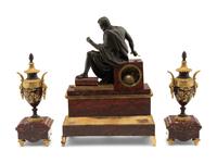A Large French Gilt and Patinated Bronze and Marble Figural Clock Garniture
