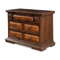 An Italian Carved Walnut Chest of Drawers